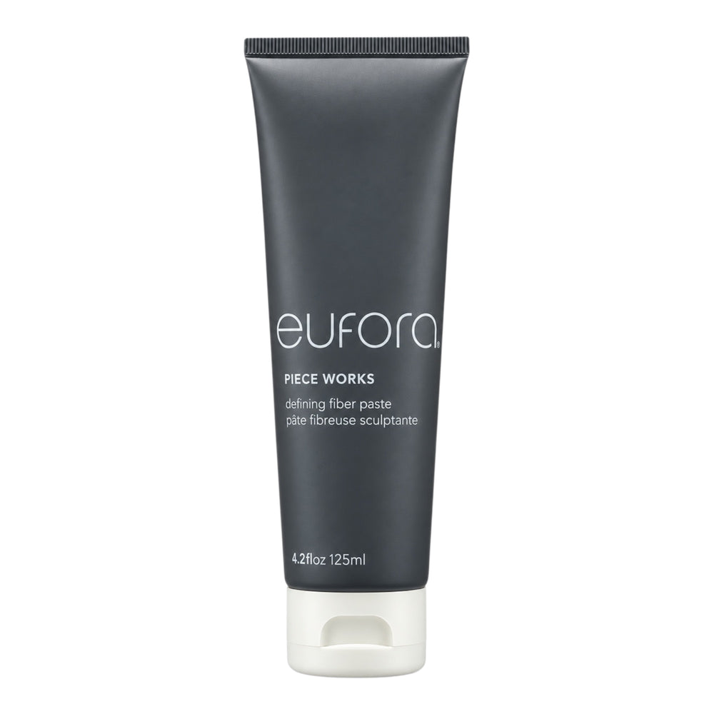 Eufora Style Piece Works Defining Fiber Paste 4.2 oz in a clear jar, showing the textured hair styling product for flexible hold.
