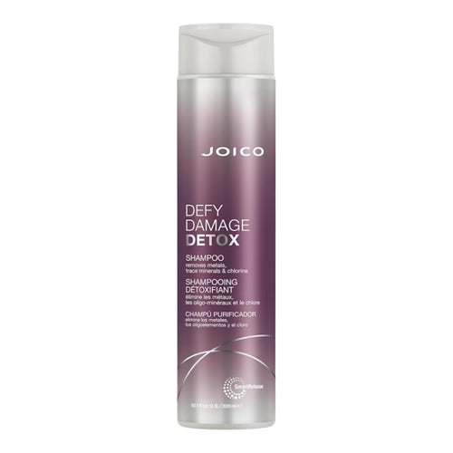 Joico Defy Damage Detox Shampoo bottle, 10.1 oz, featuring a sleek design, ideal for repairing and cleansing damaged hair.