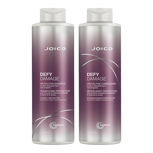Joico Defy Damage shampoo and conditioner set with 33.8 oz bottles, featuring protective formulas for damaged hair.