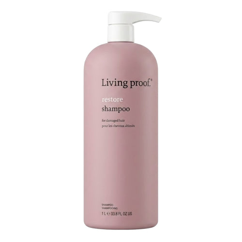 Living Proof Restore Shampoo 32 Oz bottle, hydrating hair care product with a sleek white and blue packaging design.